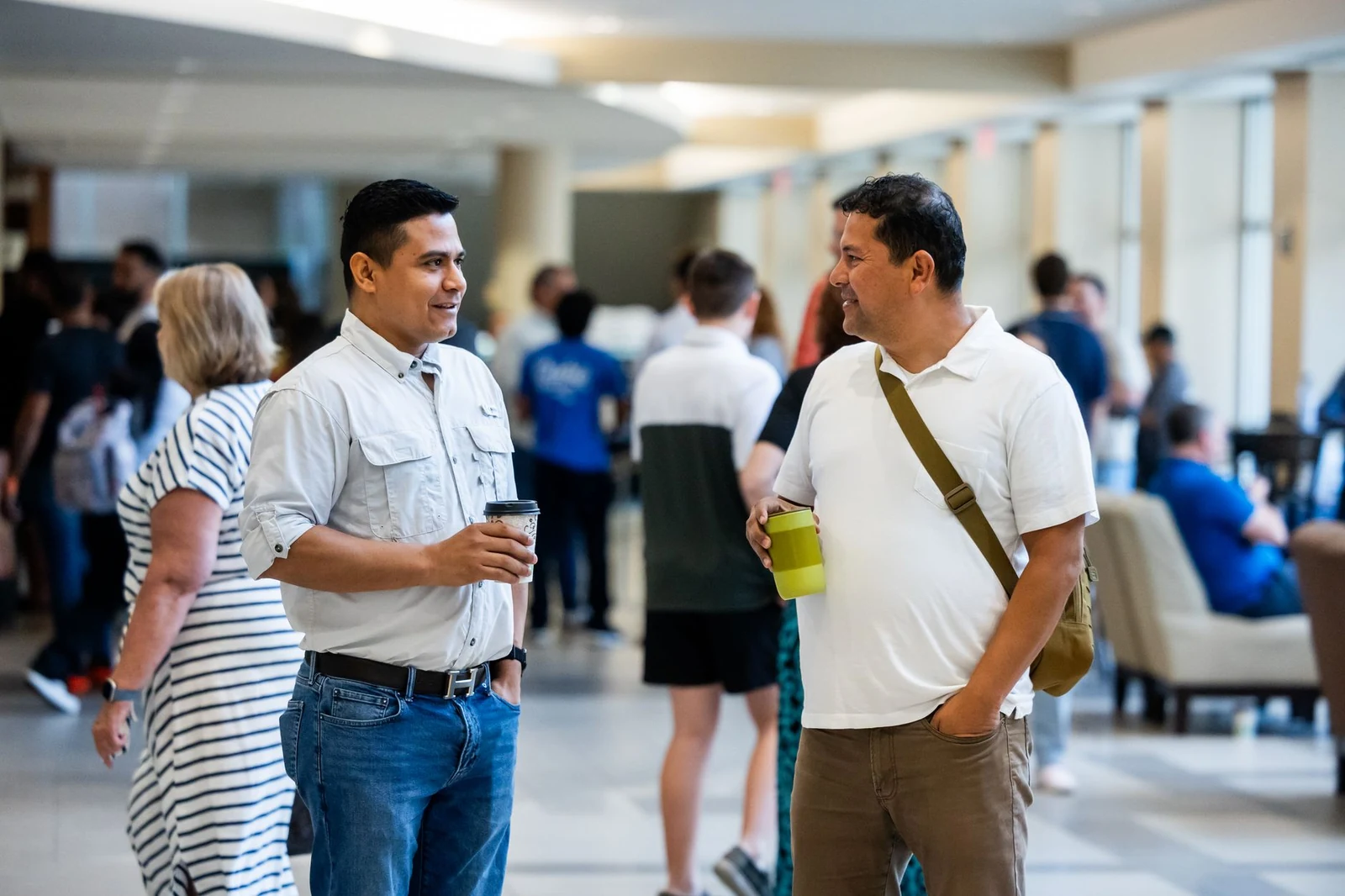 Professionals talking at a networking event