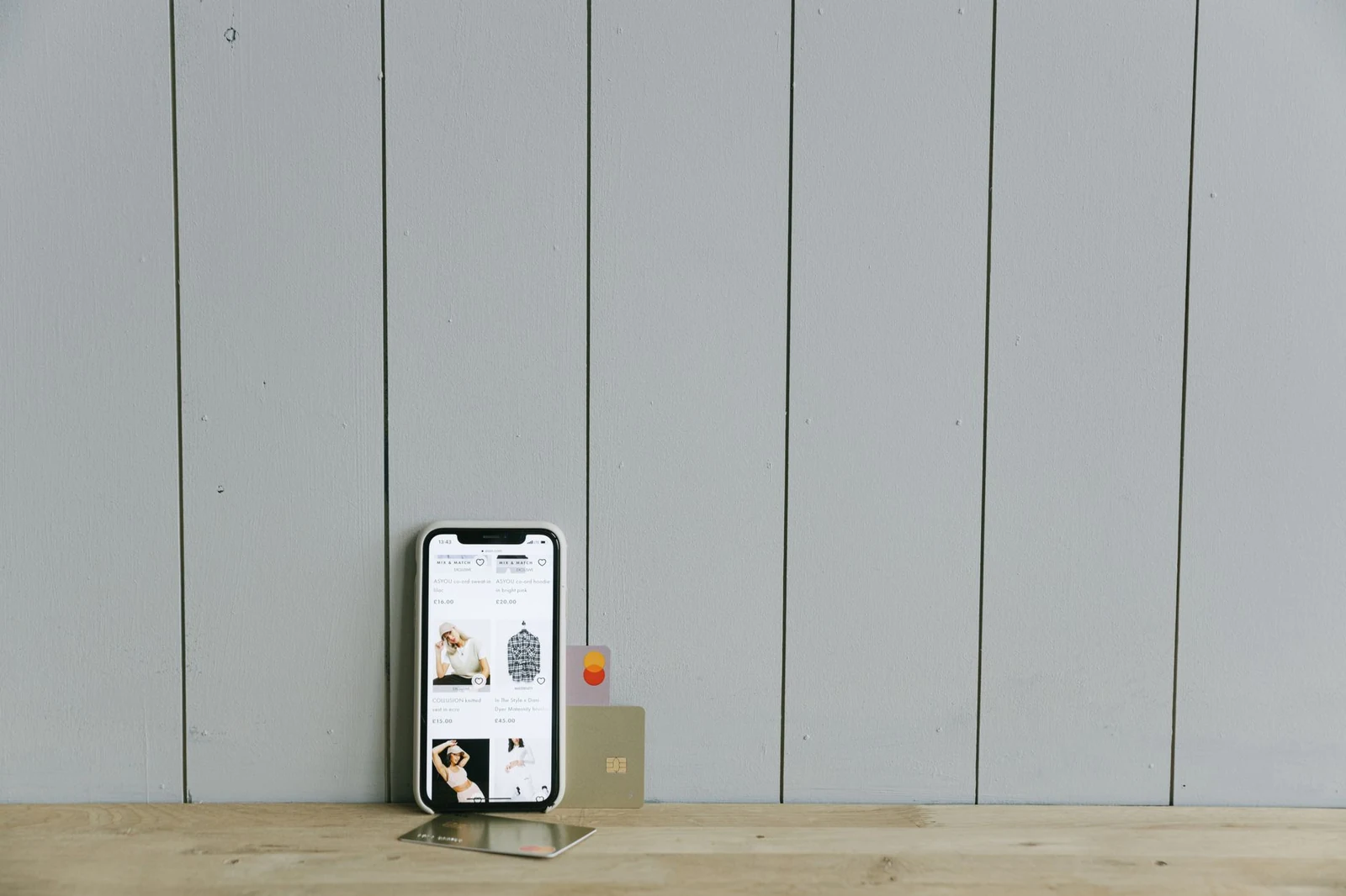 Business cards and a phone laid out before a networking event