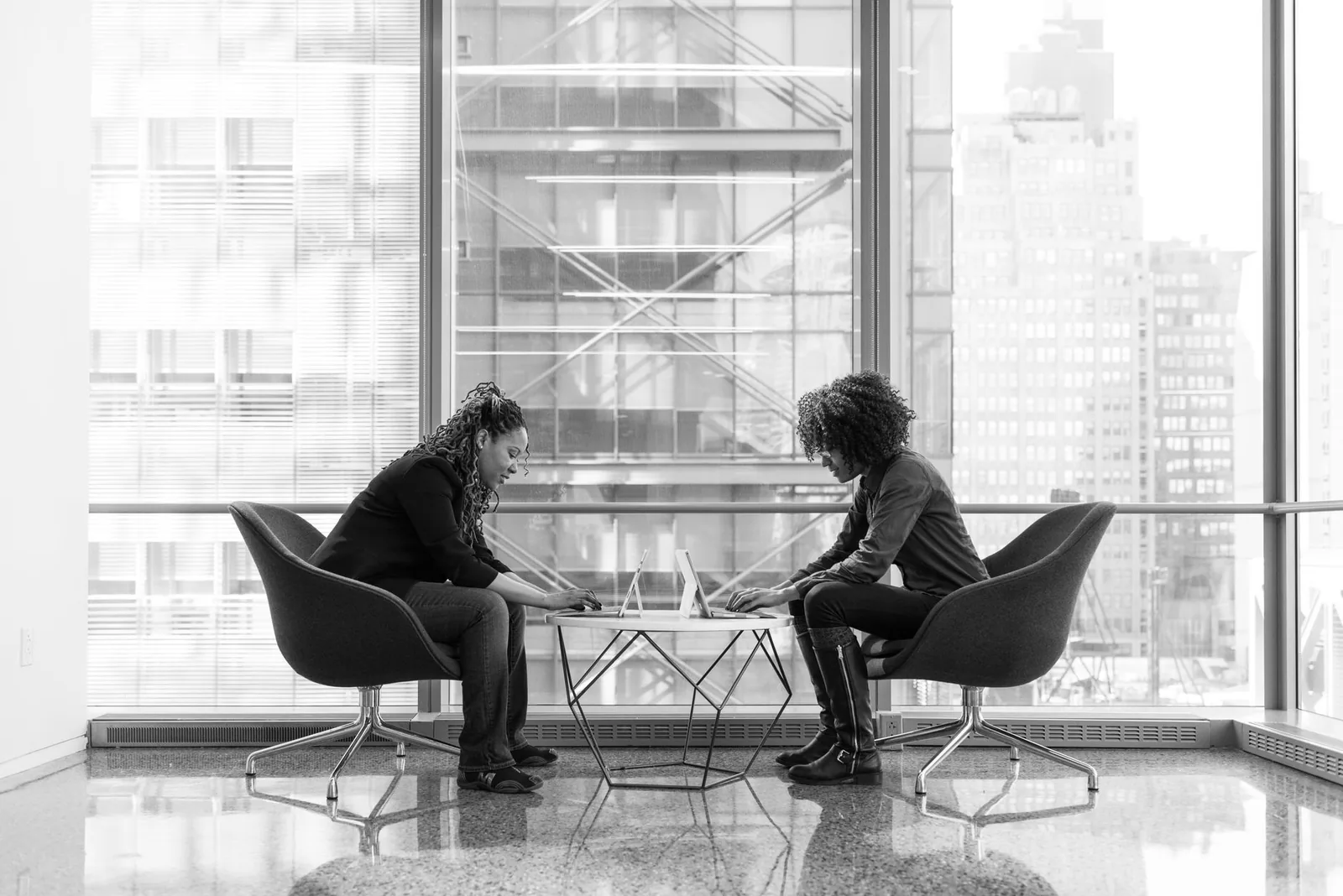 Manager and employee in a serious one-on-one conversation
