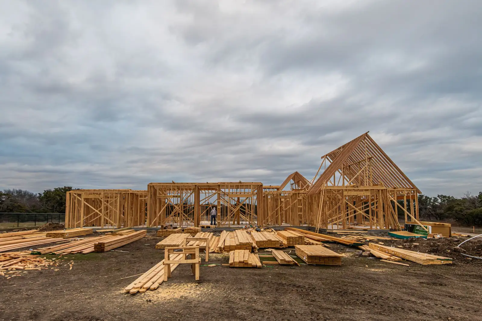 New houses under construction on a suburban street