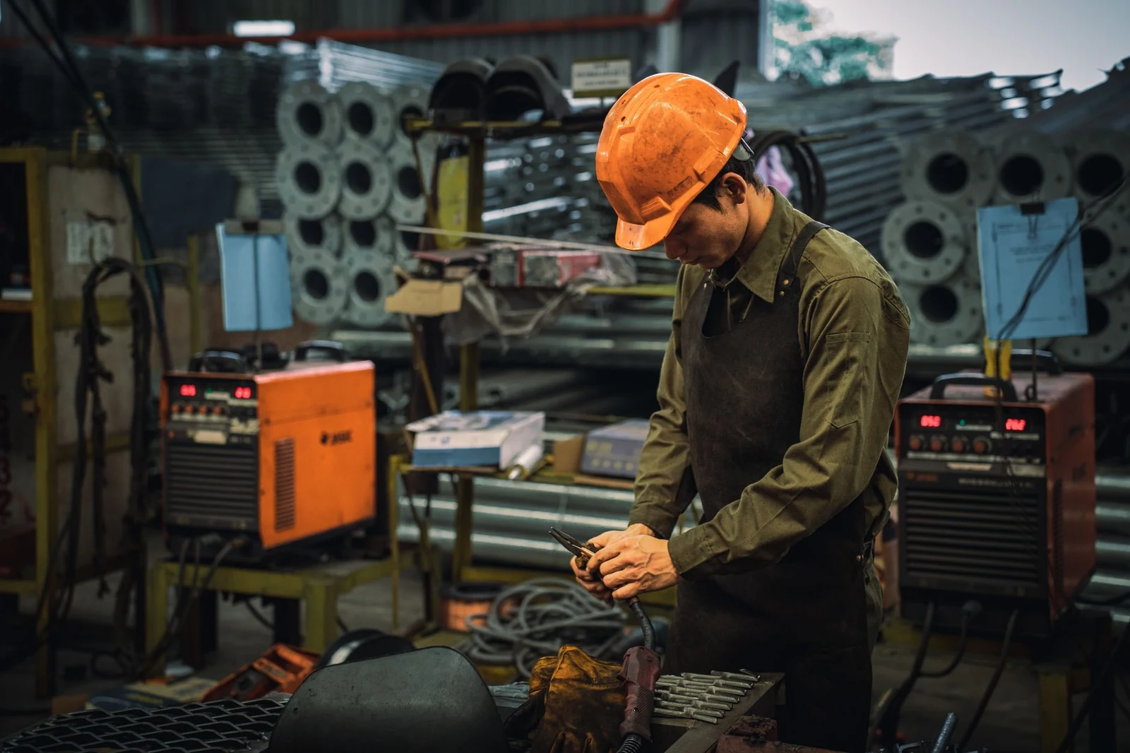 Operations leader reviewing production data on a plant floor