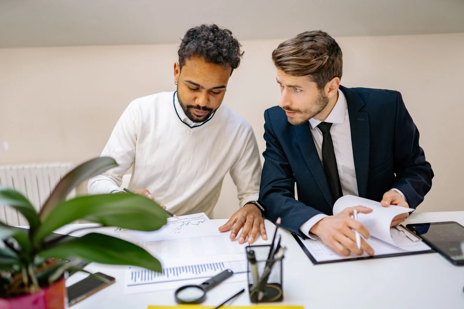 Recruiter and hiring manager reviewing a shortlist together
